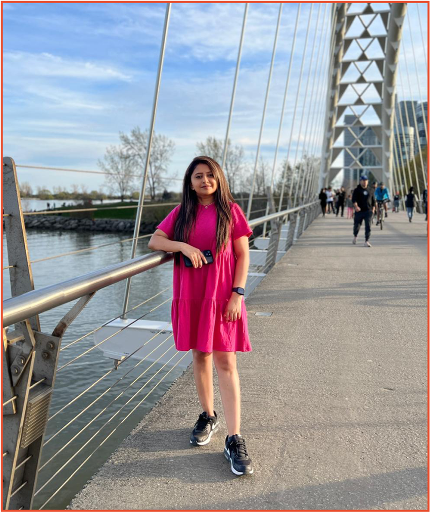 Siya on bridge in pink dress